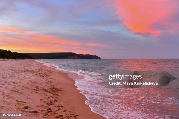 beautiful sunset at irakli wild beach, black sea coast line, bulgaria - varna stock pictures, royalty-free photos & images