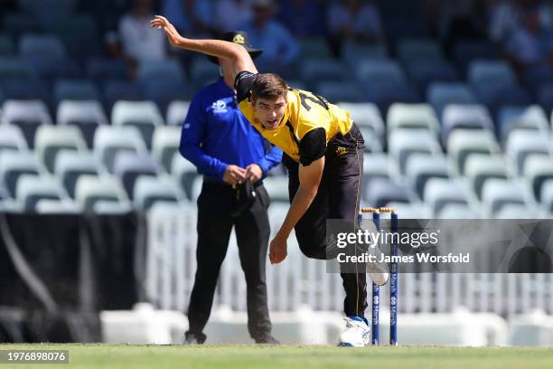 Liam Haskett of Western Australia follows through after bowling during the Marsh One Day Cup match between Western Australia and New South Wales at...