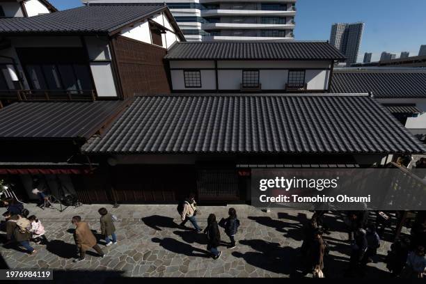 People walk through the Toyosu Senkyaku Banrai shopping complex on February 01, 2024 in Tokyo, Japan. The facility that was built as a part of...