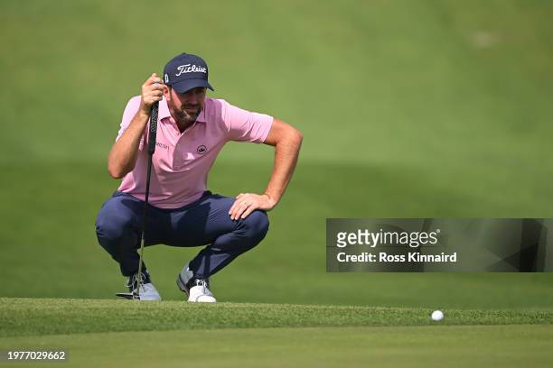 Scott Jamieson of Scotland lines up a putt on the 17th green during Day One of the Bahrain Championship presented by Bapco Energies at Royal Golf...