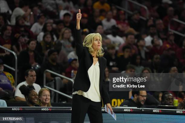 Washington Huskies coach Tina Langley reacts against the Southern California Trojans during an NCAA college women's basketball game in Los Angeles on...