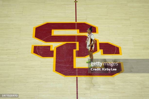 Southern California Trojans guard JuJu Watkins stands on the SC logo at center court against the Washington Huskies during an NCAA college women's...