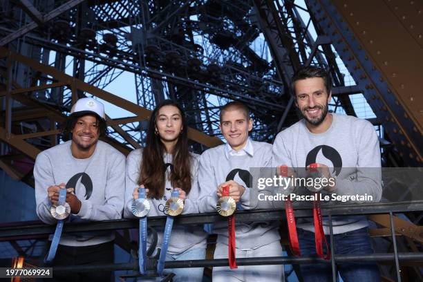 In this image released on February 8, Arnaud Assoumani, Sara Balzer, Marie Patouillet and Tony Estanguet attend the unveiling of the Paris 2024...