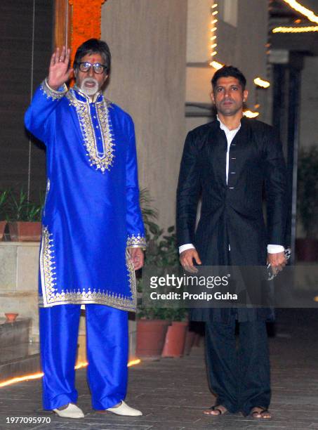 Amitabh Bachchan and Farhan Akhtar attend the Bachchan Family dewali bash on October 23,2014 in Mumbai, India