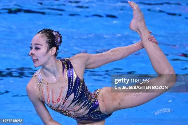 Team China competes in the final of the acrobatic routine artistic swimming event during the 2024 World Aquatics Championships at Aspire Dome in Doha...