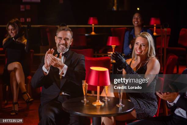 theatre cabaret audience enjoying a show - centro de artes e espetáculos imagens e fotografias de stock