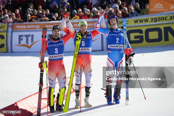 Loic Meillard of Team Switzerland takes 2nd place, Daniel Yule of Team Switzerland takes 1st place, Clement Noel of Team France takes 3rd place...