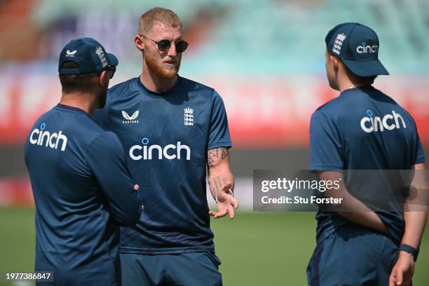 England captain Ben Stokes chats with head coach Brendon McCullum and Ollie Pope after a look at the pitch during England practice ahead of the...