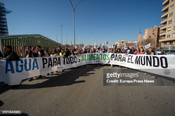 The head of the demonstration with the slogan "Water for all food for the World" runs through the streets of Seville, on February 1 in Seville,...