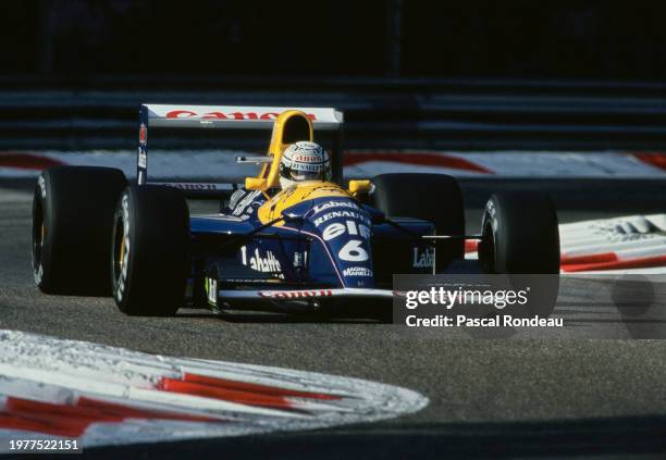 Riccardo Patrese from Italy drives the Canon Williams Renault Williams FW14B Renault V10 during practice for the Formula One Italian Grand Prix on...