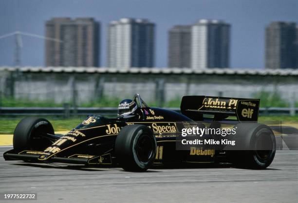Johnny Dumfries aka John Crichton-Stuart, 7th Marquess of Bute from Great Britain drives the John Player Special Team Lotus-Renault 98T Renault V6...