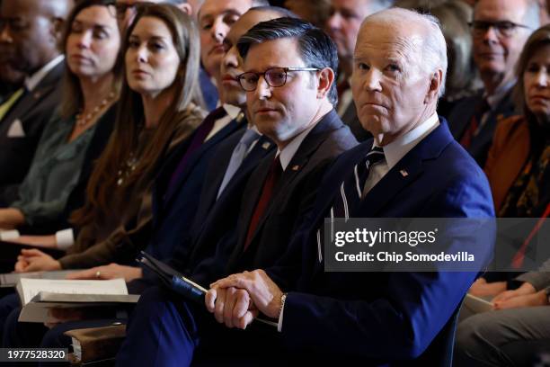 President Joe Biden, Speaker of the House Mike Johnson and House Minority Leader Hakeem Jeffries listen as Andrea Bocelli performs "Amazing Grace"...