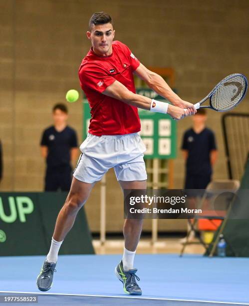 Limerick , Ireland - 4 February 2024; Alexander Erler of Austria in action against David O'Hare and Conor Gannon of Ireland during his doubles match...