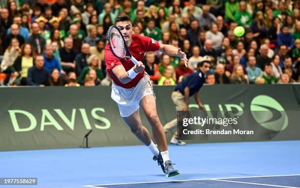 Limerick , Ireland - 4 February 2024; Alexander Erler of Austria in action against David O'Hare and Conor Gannon of Ireland during his doubles match...