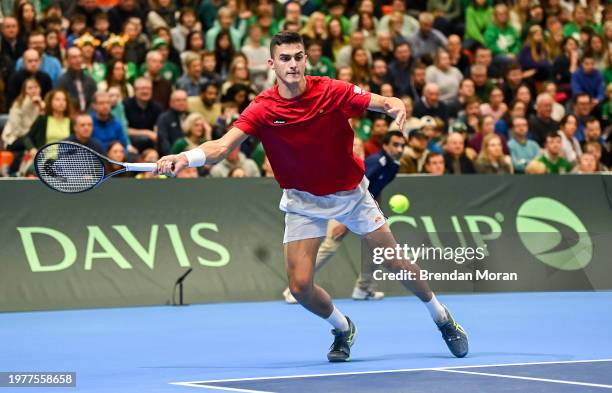 Limerick , Ireland - 4 February 2024; Alexander Erler of Austria in action against David O'Hare and Conor Gannon of Ireland during his doubles match...