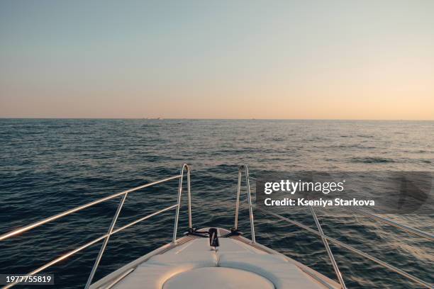 seascape at sunset view from a yacht - yacht foto e immagini stock