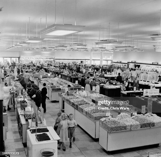 Shoppers browse the wares, including a pick and mix in the foreground , in the new British Home Stores department store in Coventry, Warwickshire,...