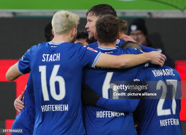 February 2024, Lower Saxony, Wolfsburg: Soccer: Bundesliga, VfL Wolfsburg - TSG 1899 Hoffenheim, Matchday 20, Volkswagen Arena: Hoffenheim's players...