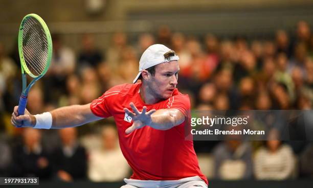 Limerick , Ireland - 4 February 2024; Lucas Miedler of Austria in action against Michael Agwi of Ireland during their singles match on day two of the...
