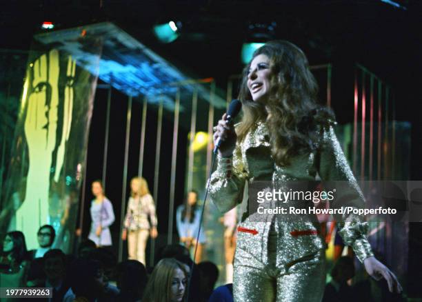American singer Bobbie Gentry performs in front of a studio audience on the set of a pop music television show in London circa 1969.