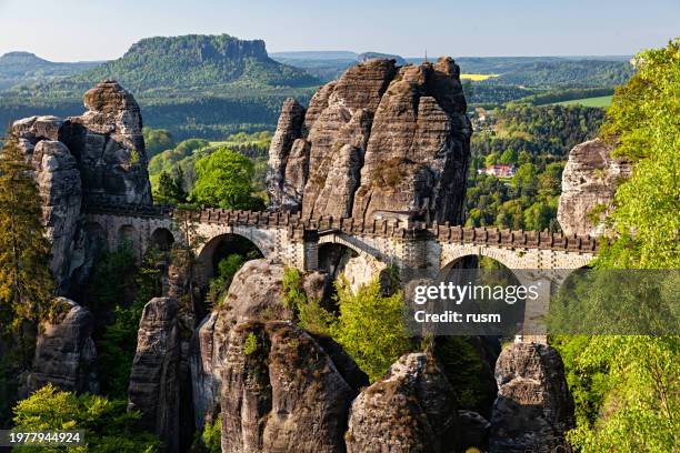 morning view bastei rocks and bridge in saxon switzerland, germany - saxony stock pictures, royalty-free photos & images