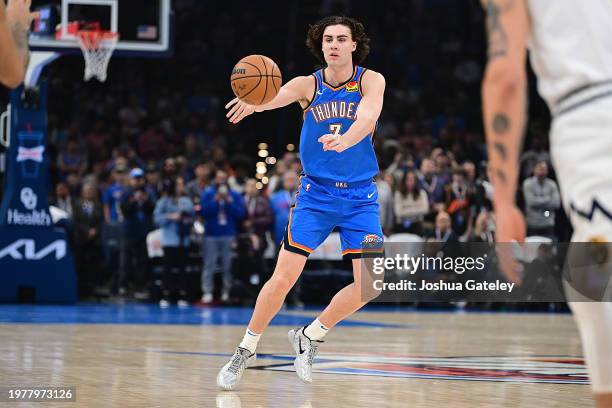 Josh Giddey of the Oklahoma City Thunder passes the ball during the first half against the Denver Nuggets at Paycom Center on January 31, 2024 in...