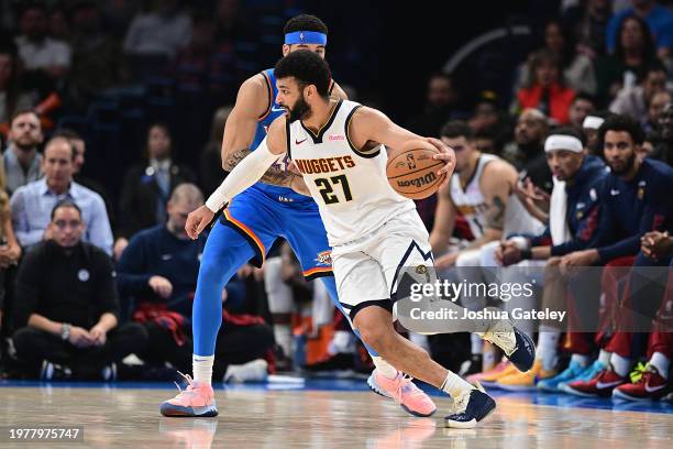 Jamal Murray of the Denver Nuggets looks to drive during the first half against the Oklahoma City Thunder at Paycom Center on January 31, 2024 in...