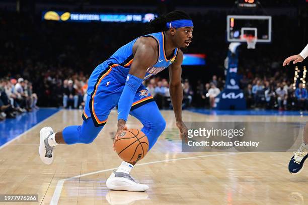 Luguentz Dort of the Oklahoma City Thunder handles the ball during the first half against the Denver Nuggets at Paycom Center on January 31, 2024 in...