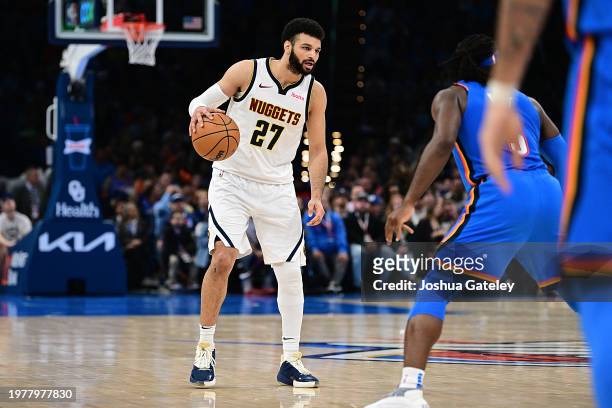 Jamal Murray of the Denver Nuggets handles the ball during the second half against the Oklahoma City Thunder at Paycom Center on January 31, 2024 in...