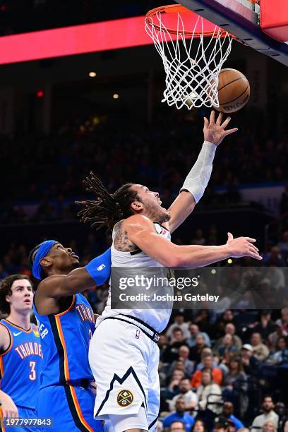 Aaron Gordon of the Denver Nuggets goes up for a layup during the second half against the Oklahoma City Thunder at Paycom Center on January 31, 2024...