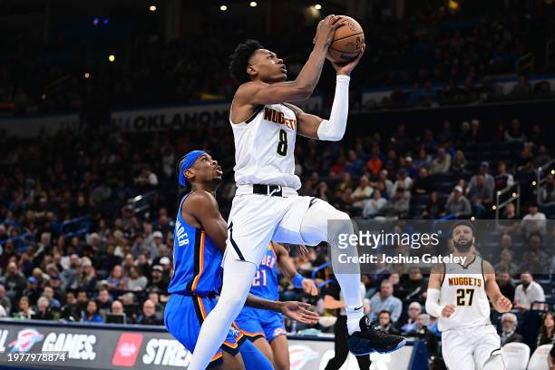 Peyton Watson of the Denver Nuggets goes up for a shot during the second half against the Oklahoma City Thunder at Paycom Center on January 31, 2024...