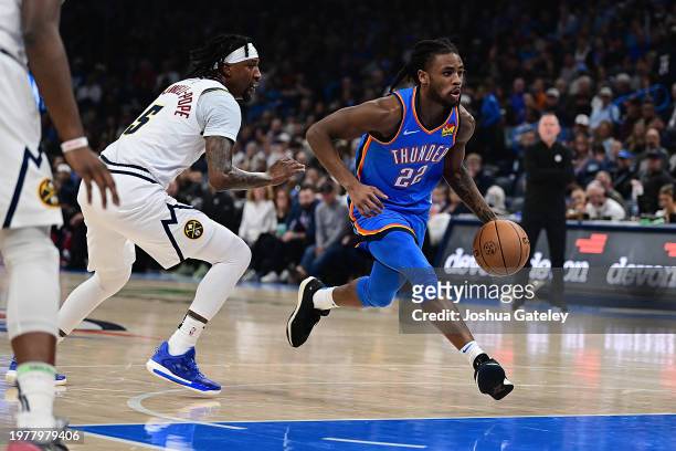 Cason Wallace of the Oklahoma City Thunder drives the lane during the first half against the Denver Nuggets at Paycom Center on January 31, 2024 in...
