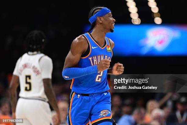 Shai Gilgeous-Alexander of the Oklahoma City Thunder celebrates after a made basket during the second half against the Denver Nuggets at Paycom...