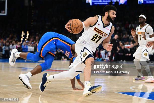 Jamal Murray of the Denver Nuggets handles the ball during the second half against the Oklahoma City Thunder at Paycom Center on January 31, 2024 in...