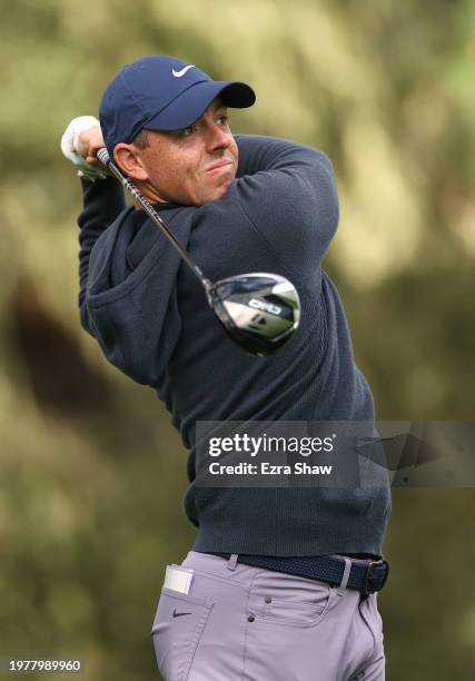 Rory McIlroy of Northern Ireland plays his shot from the 13th tee during the first round of the AT&T Pebble Beach Pro-Am at Spyglass Hill Golf Course...