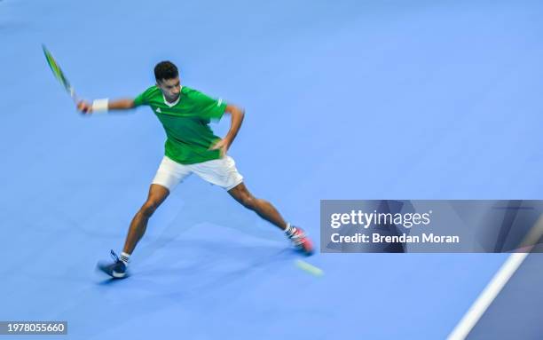 Limerick , Ireland - 4 February 2024; Michael Agwi of Ireland in action against Lucas Miedler of Austria during their singles match on day two of the...