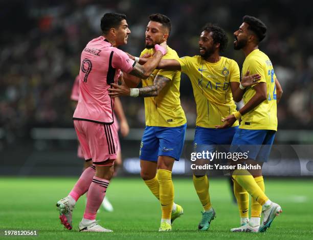 Luis Suarez of Inter Miami clashes with Alex Telles, Abdulmajeed Al Sulaiheem and Nawaf Mashari Abdulrahman Boushal of Al-Nassr during the Riyadh...