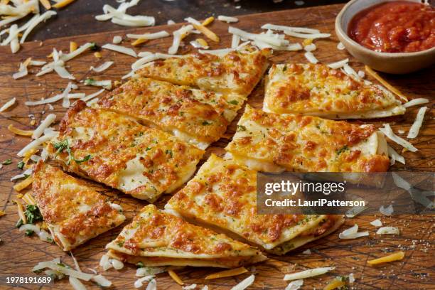 the viral crispy air fried tortilla cheesy garlic bread - imitation cheese stock pictures, royalty-free photos & images