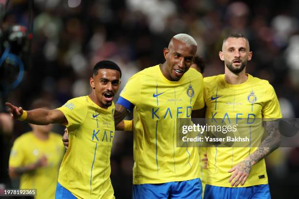 Anderson Talisca of Al-Nassr celebrates with Abdulaziz Al Elewai and Marcelo Brozovic after scoring his team's fourth goal during the Riyadh Season...