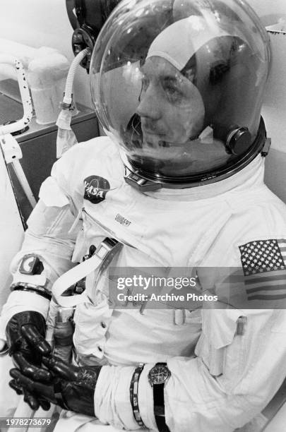 Astronaut John L. Swigert Jr., command module pilot for the Apollo 13 mission during the prelaunch countdown at the Kennedy Space Center's Manned...