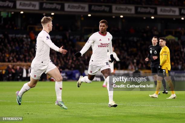 Marcus Rashford of Manchester United celebrates scoring his team's first goal during the Premier League match between Wolverhampton Wanderers and...