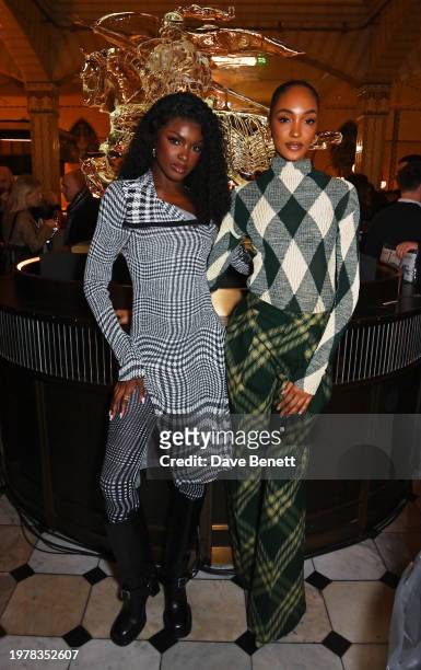 Leomie Anderson and Jourdan Dunn attend the opening of the Burberry takeover of Harrods on February 1, 2024 in London, England.