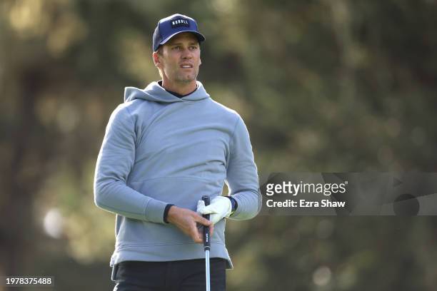 Former NFL quarterback Tom Brady watches his shot during the first round of the AT&T Pebble Beach Pro-Am at Spyglass Hill Golf Course on February 01,...