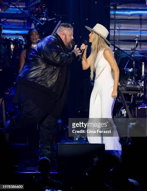 Jelly Roll and Lainey Wilson perform during the 66th Grammy Awards Pre-Grammy Gala at the Beverly Hilton on February 3, 2024 in Beverly Hills,...