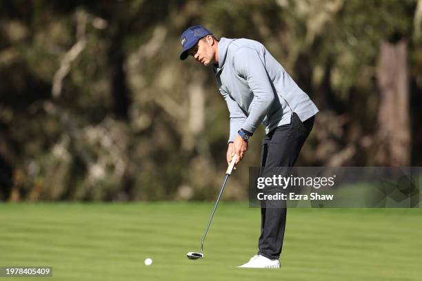 Former NFL quarterback Tom Brady putts on the 12th green during the first round of the AT&T Pebble Beach Pro-Am at Spyglass Hill Golf Course on...