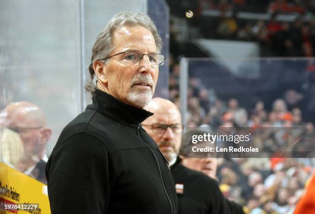 Head Coach of the Philadelphia Flyers John Tortorella watches the play on the ice during the first period against the Boston Bruins at the Wells...