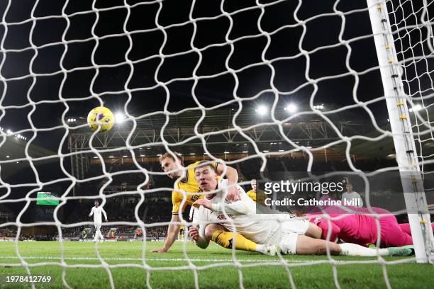 Rasmus Hojlund of Manchester United scores his team's second goal past Jose Sa of Wolverhampton Wanderers during the Premier League match between...