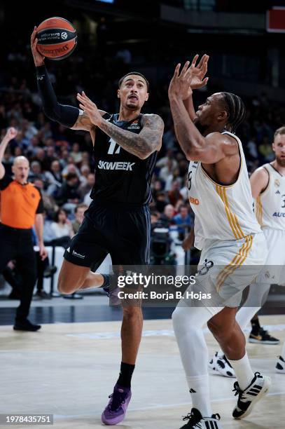 Guerschon Yabusele of Real Madrid and Edwin Jackson of LDLC Asvel Villeurbanne in action during the Turkish Airlines EuroLeague Regular Season Round...