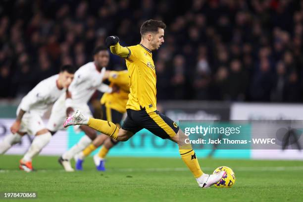 Pablo Sarabia of Wolverhampton Wanderers scores his team's first goal from the penalty-spot during the Premier League match between Wolverhampton...