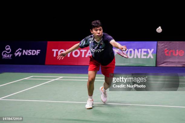 Supanida Katethong of Thailand is in action against Aya Ohori of Japan in the women's singles final match at the Badminton Princess Sirivannavari...